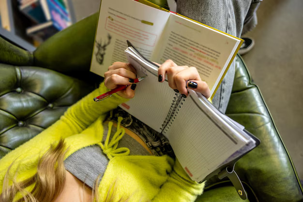 library-pretty-young-woman-making-notes-library_259150-71048