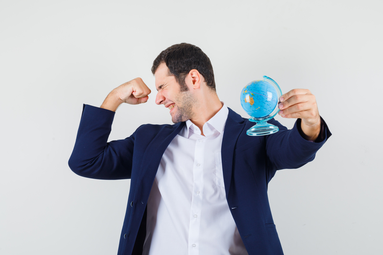 young-male-shirt-jacket-holding-school-globe-looking-blissful-2-1