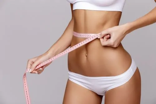 Does a slimming machine reduce cellulite on thighs and arms?